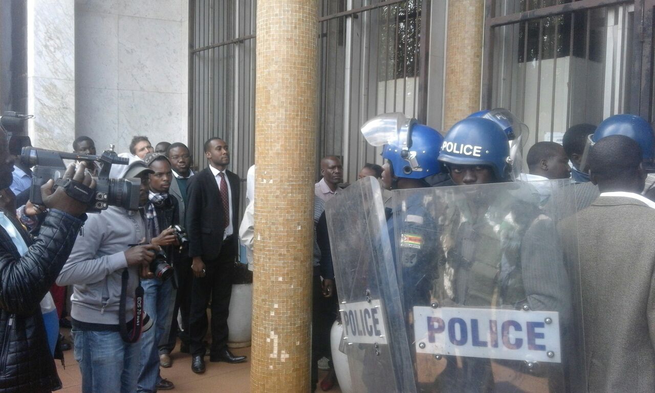 11:36 Anti-riot police closing entrance to court 6 / Photo Credit: NewsDay