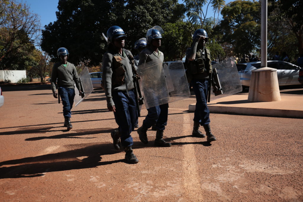 Dozens of police details, armed with baton sticks at the Harare Magistrate's Court / Photo Credit: NewsDay